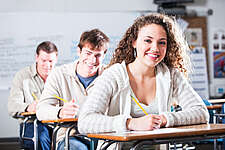 students sitting in classroom 