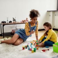 au pair playing with child 