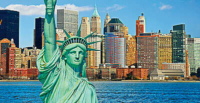 statue of liberty in front of new york city