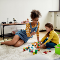 au pair playing with child