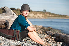 woman sitting on beach 